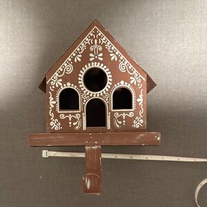 Pottery barn gingerbread house stocking holder.